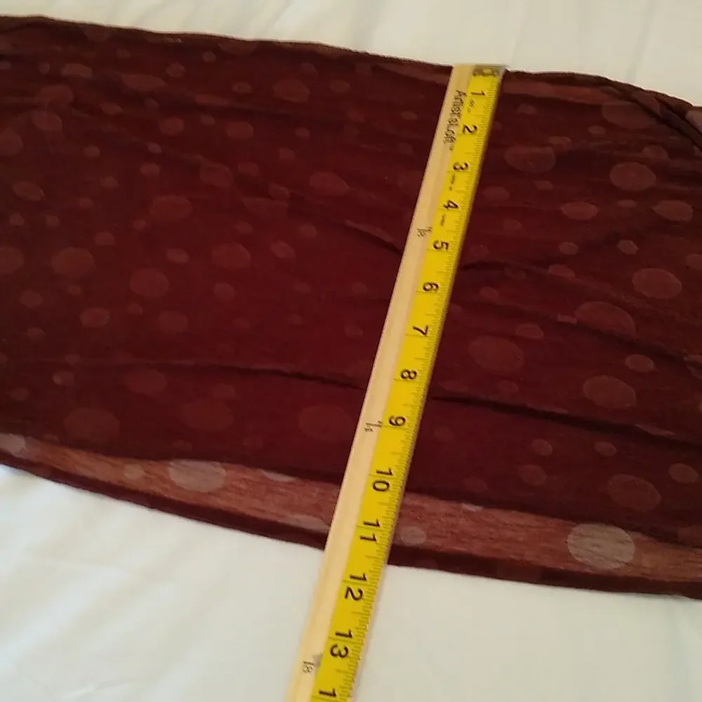 Brown polka dot women's scarf with fringe.